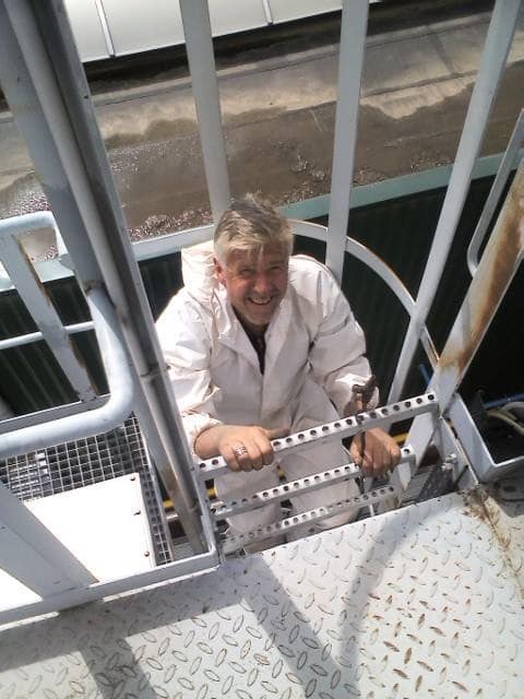 Luc Deketele op ladder
